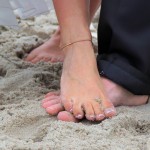 Strand mit Füßen